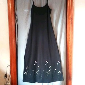 Long black dress with cute flowers at the bottom